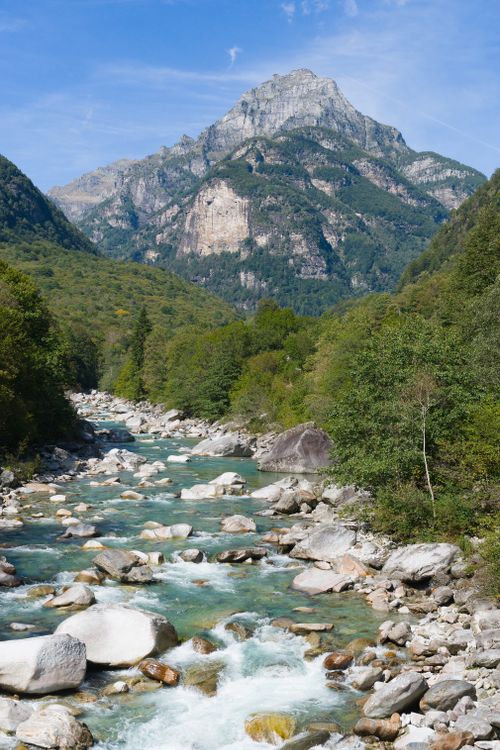 Free Beautiful view of Verzasca River flowing through Swiss Alps on a clear day. Stock Photo