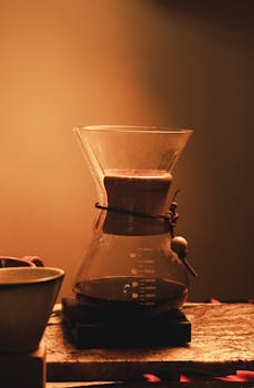 Coffee brewed in a Chemex with a warm, inviting atmosphere.