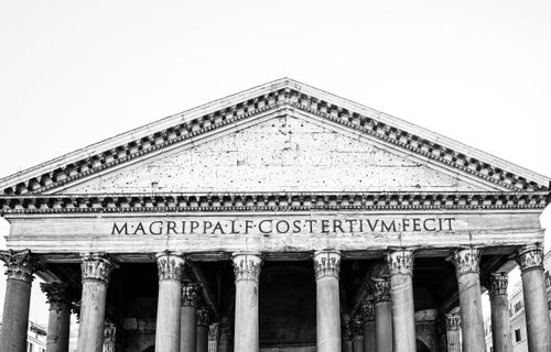 Free Black and white photo of the iconic Pantheon facade in Rome, showcasing ancient Roman architecture. Stock Photo