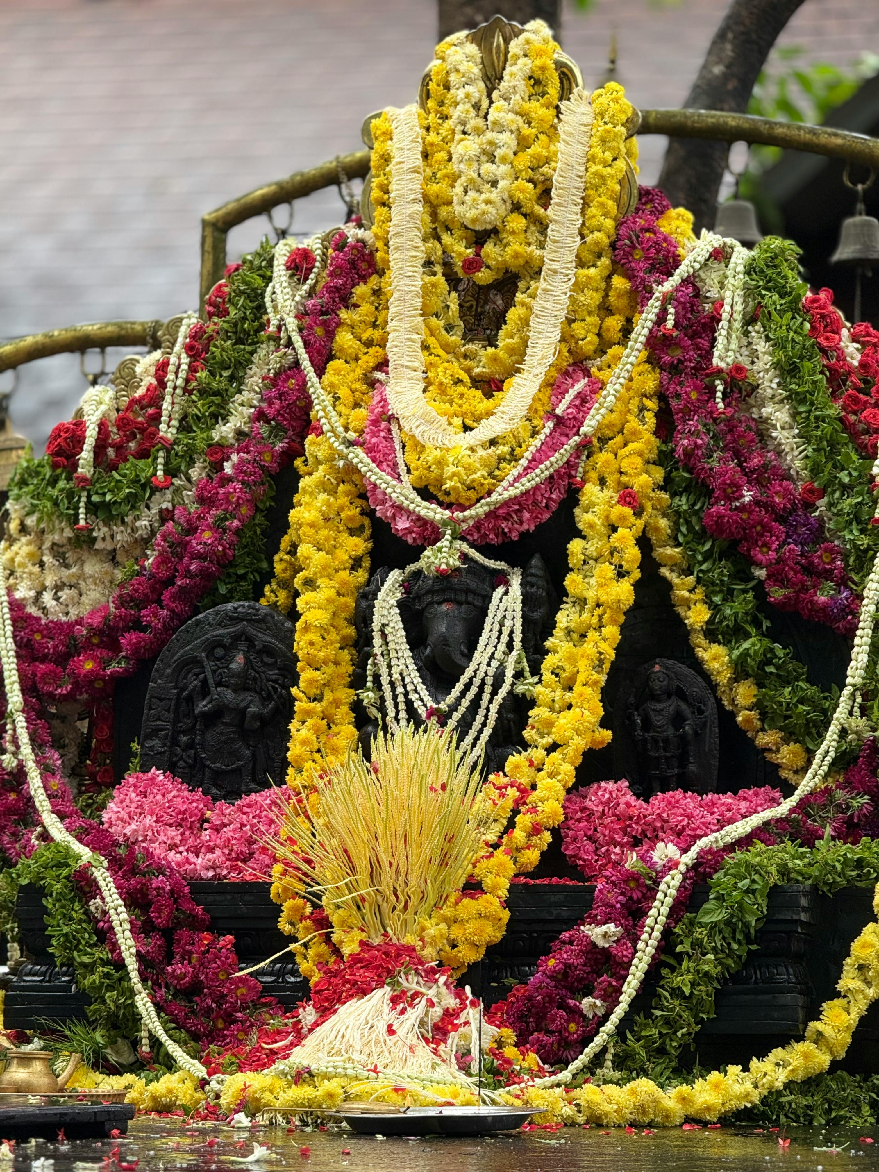 Vibrant floral adorned Ganapati idol at Sowthadka temple, Kokkada, Karnataka, India.