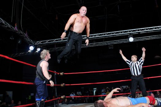 Photography of Man Jumping on Ring 