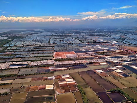 Breathtaking aerial view of North Kalimantan's lush landscapes and vibrant sky.
