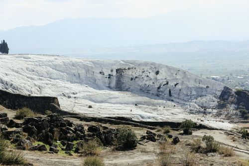 Free Explore the stunning natural travertine terraces of Pamukkale, Turkey, on a bright day. Stock Photo