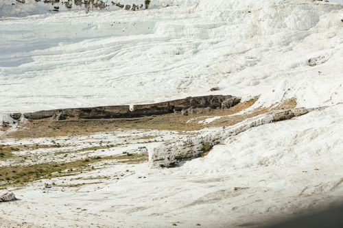 Free Beautiful white travertine terraces in Pamukkale, Turkey, showcasing natural wonders and historical landscapes. Stock Photo