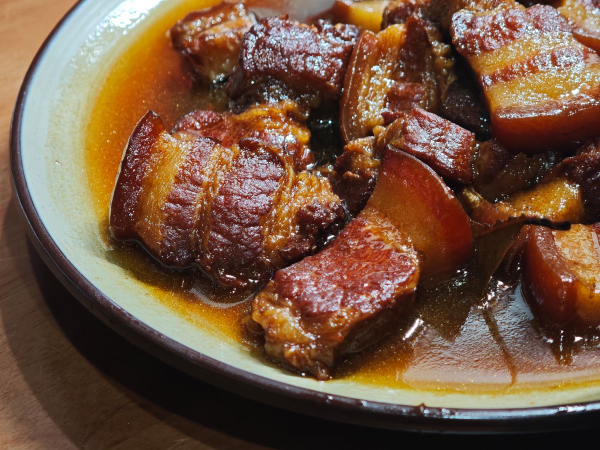 Moo hong style dark soy-braised pork belly cubes in a bowl, Phuket braised pork belly