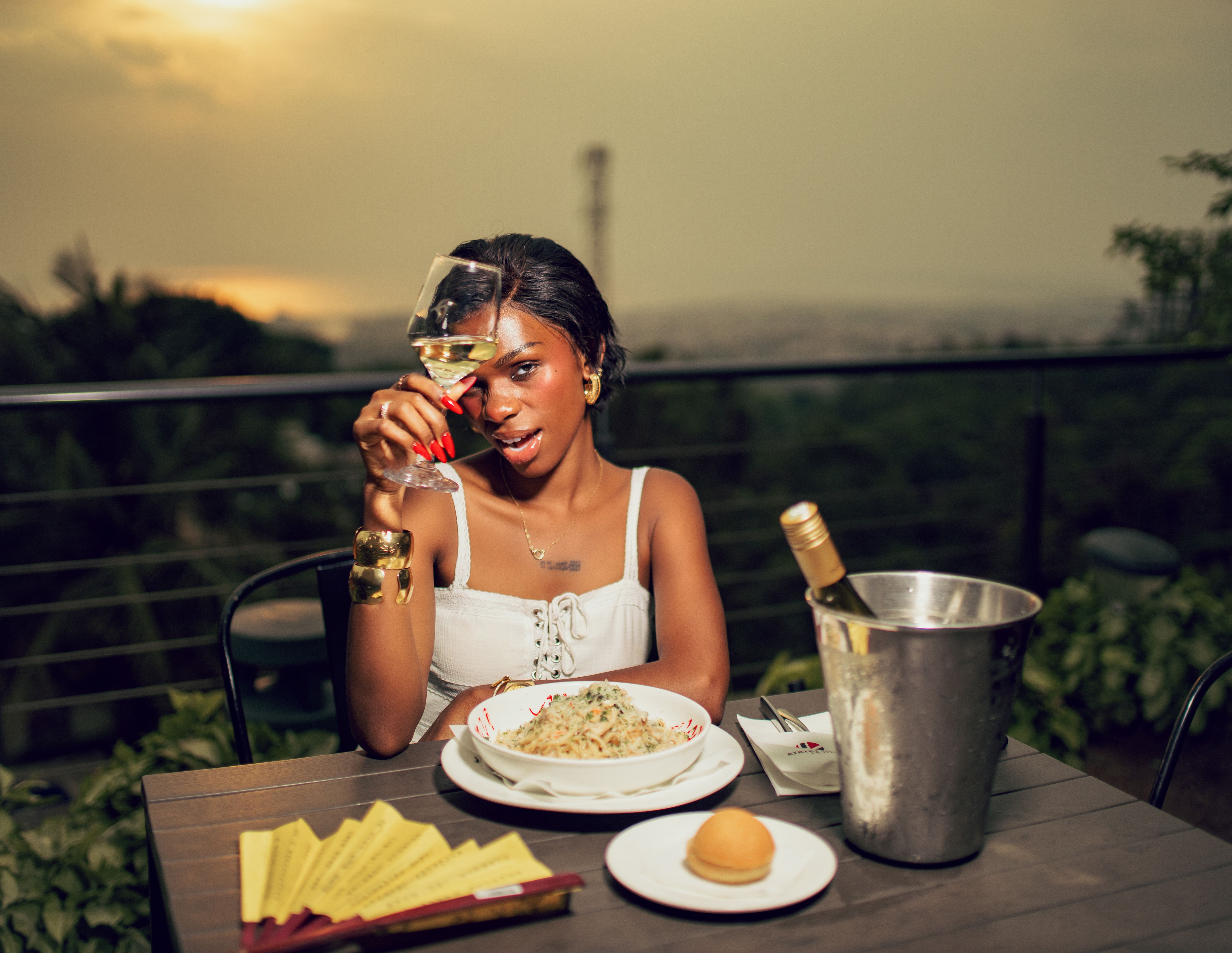 Elegant sunset dining with wine