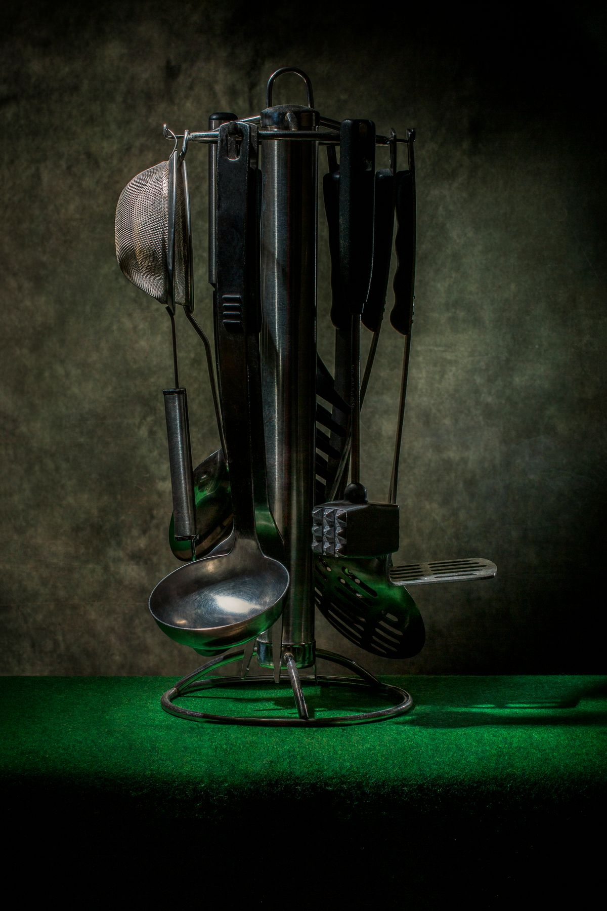 Elegant kitchen utensils arranged as a refined housewarming gift idea