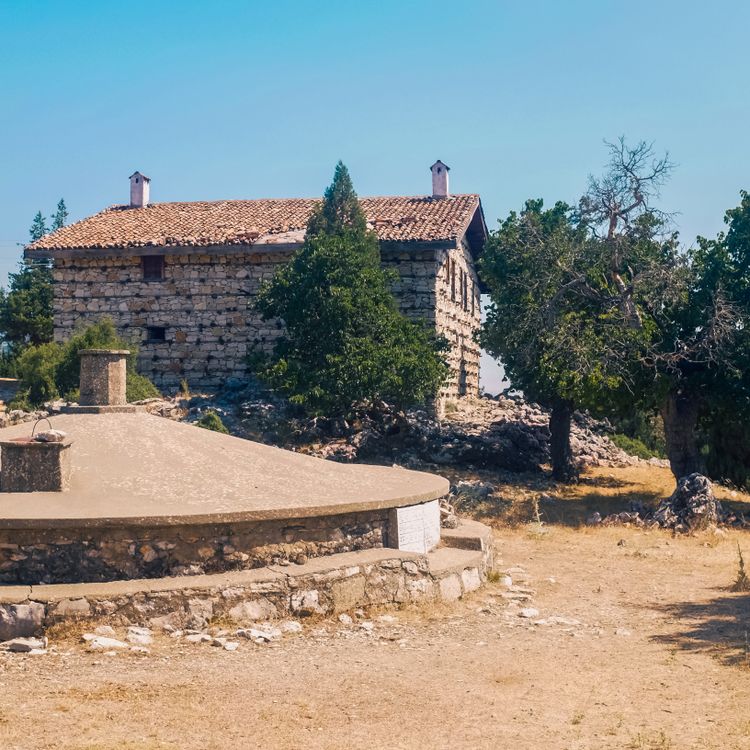 Rustic Stone House in Rural Landscape · Free Stock Photo