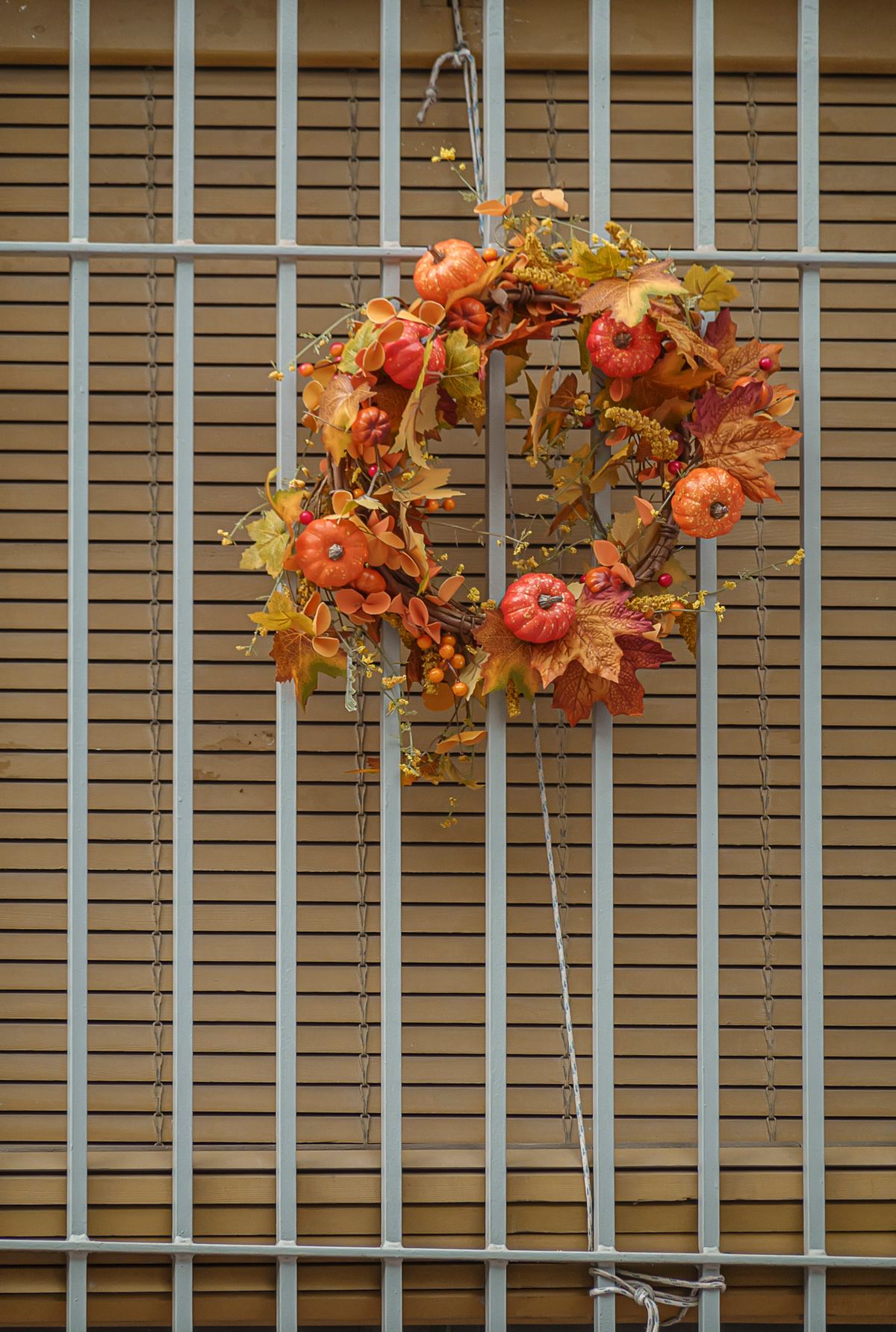 Autumn wreath decorated with mini pumpkins