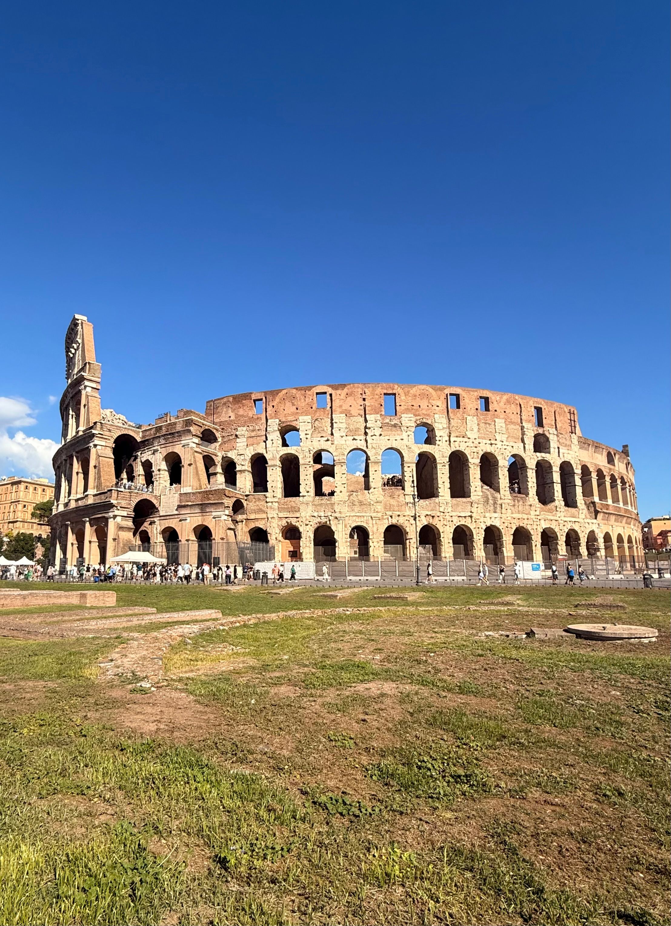 Colosseum in Rome Under Clear Blue Sky · Free Stock Photo