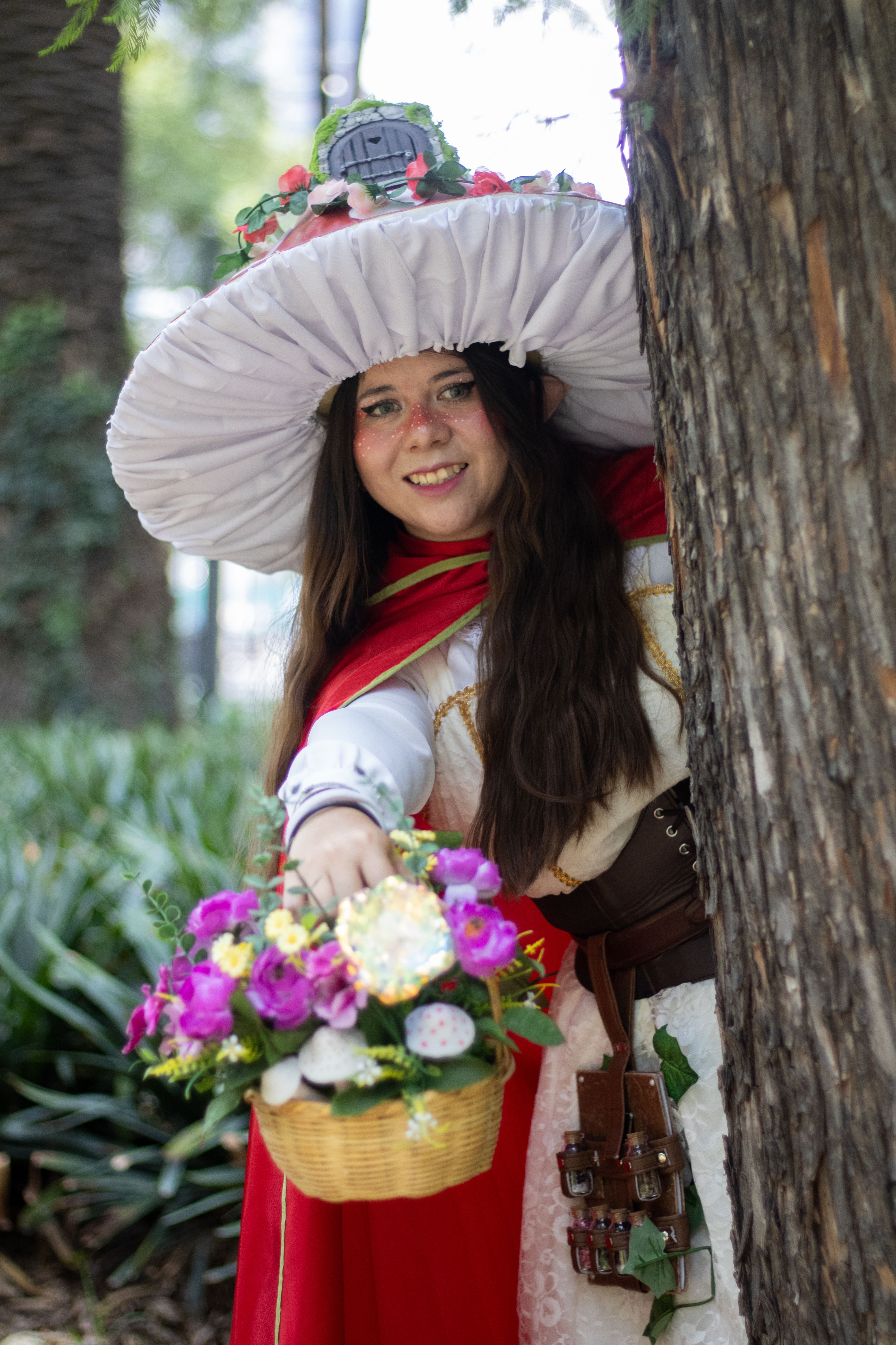 Cosplay Enthusiast Offering Floral Basket Outdoors