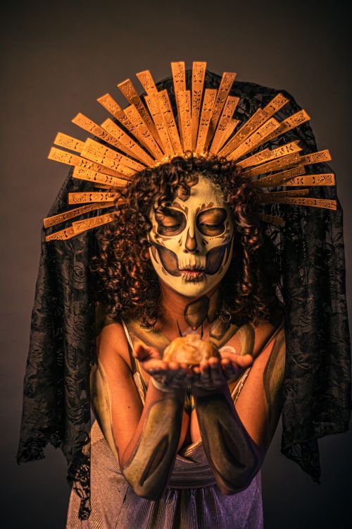 Free Striking portrait of a catrina with elaborate headdress, embodying Día de Muertos spirit. Stock Photo