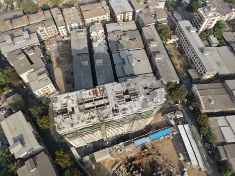 High-angle view of a construction site amid buildings in Mumbai, India