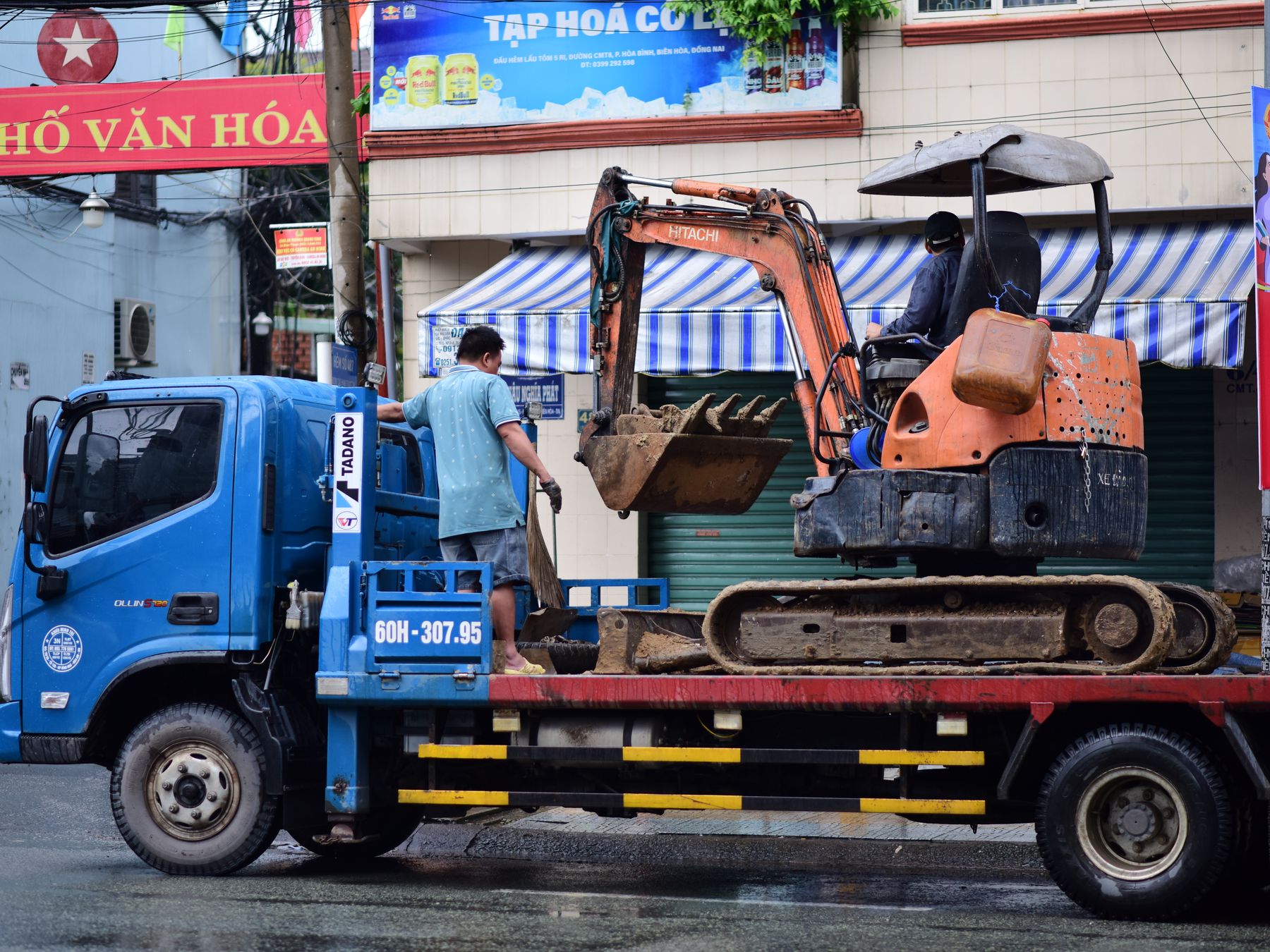 Bourn — man and van team loading a removal van