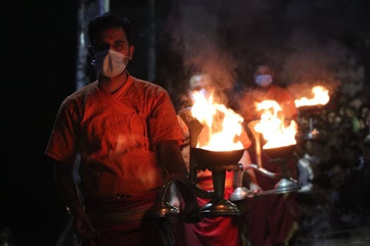Devotees perform Aarti ceremony at Pashupatinath Temple in Kathmandu, Nepal, embracing Hindu traditions.