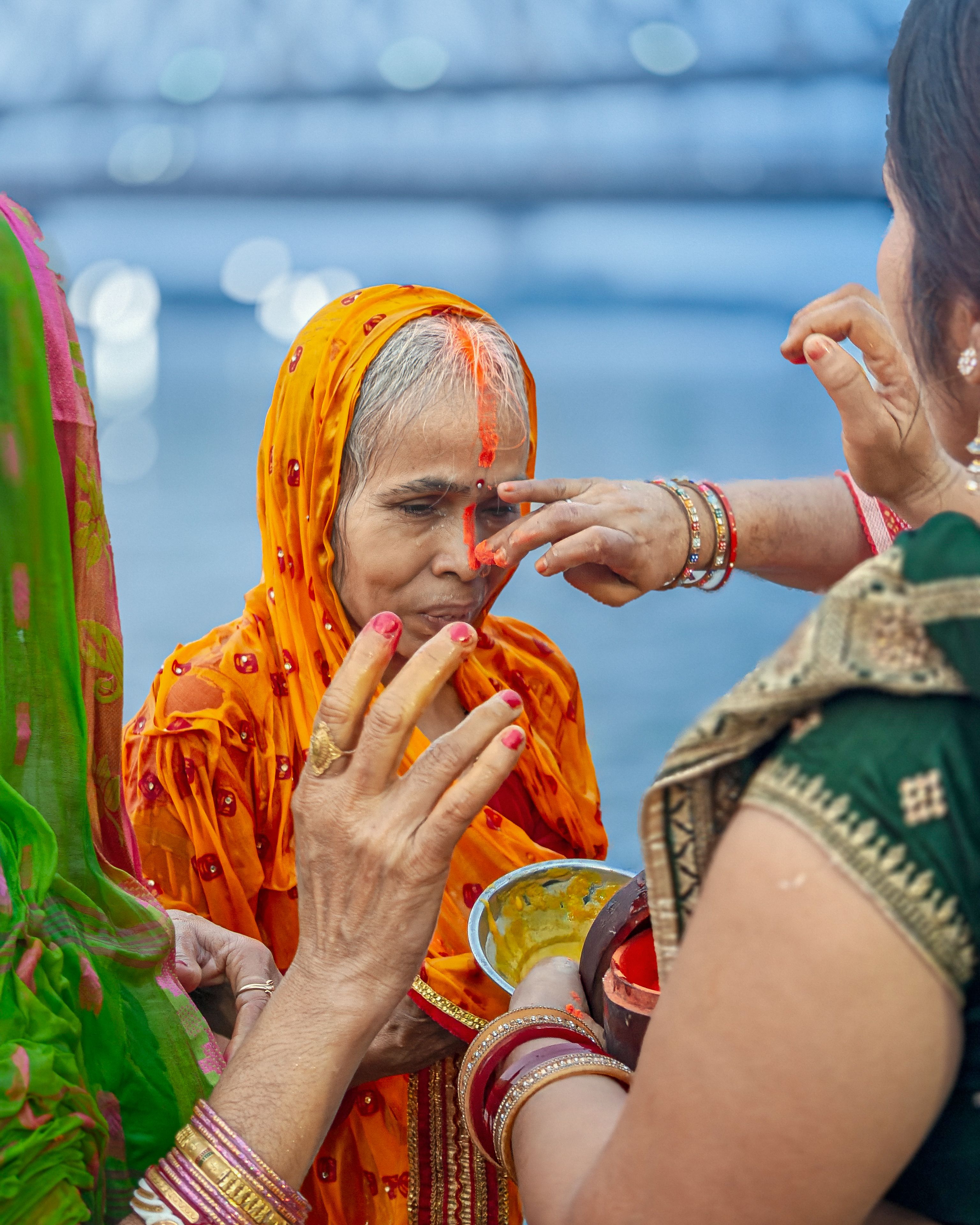 Traditional Ritual at a Sacred Riverbank · Free Stock Photo