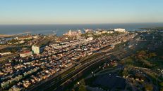 A stunning aerial view of Buenos Aires, capturing the city's vibrant urban landscape at sunrise.