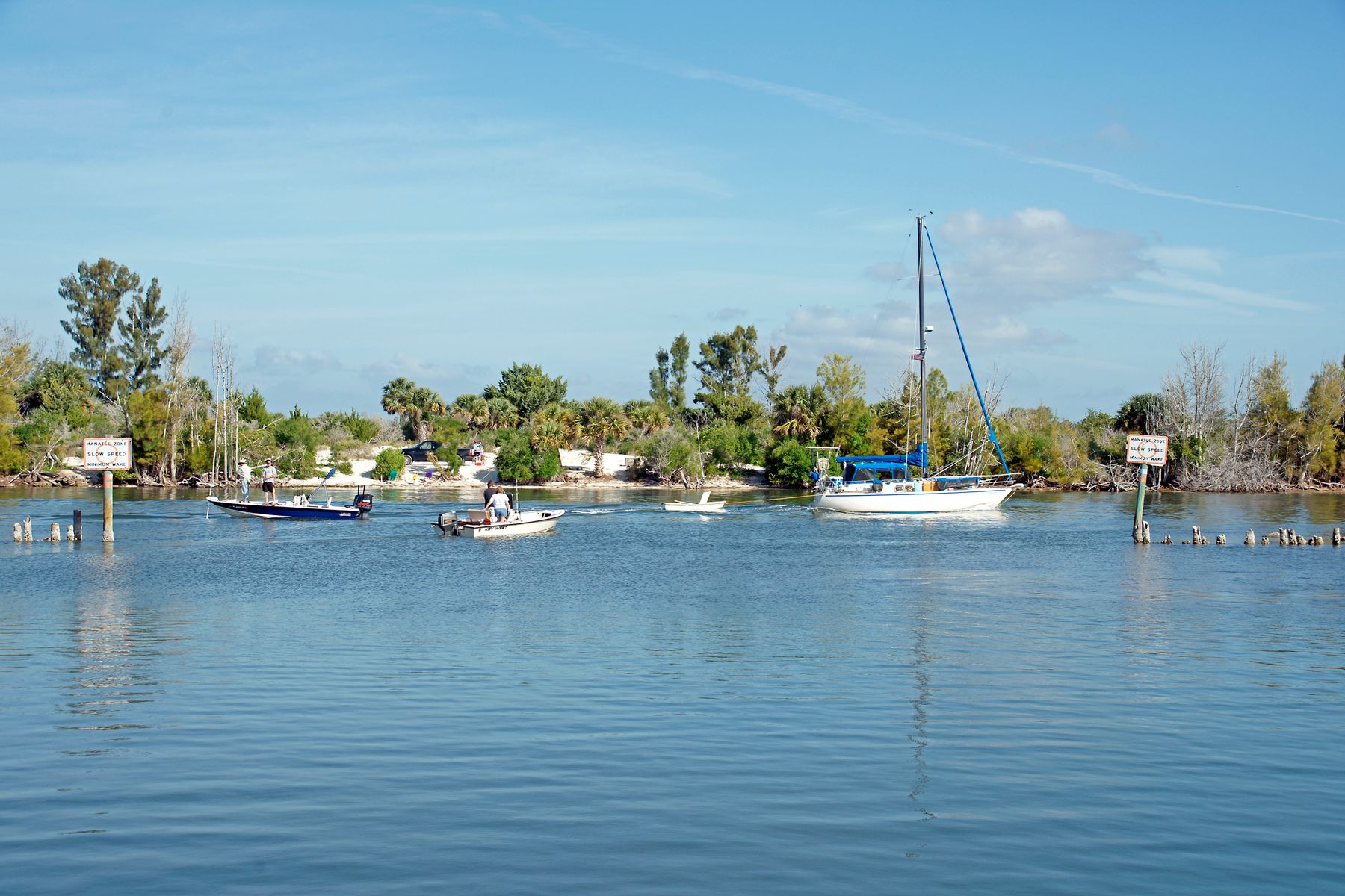 Boat traveling through a Florida canal