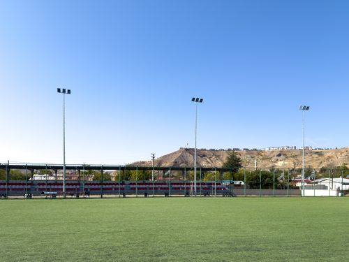 Free A wide-angle shot of a sports field in Palu, Elazığ, Türkiye with clear blue sky. Stock Photo