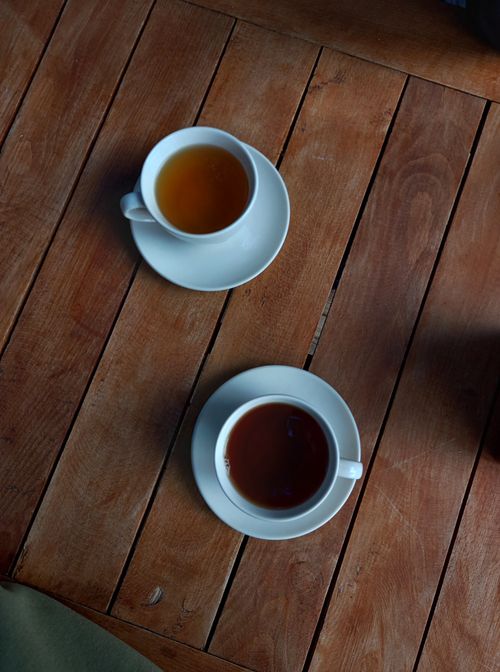 Free Top view of two cups of tea on a wooden table in Muğla, Türkiye, creating a cozy and inviting atmosphere. Stock Photo