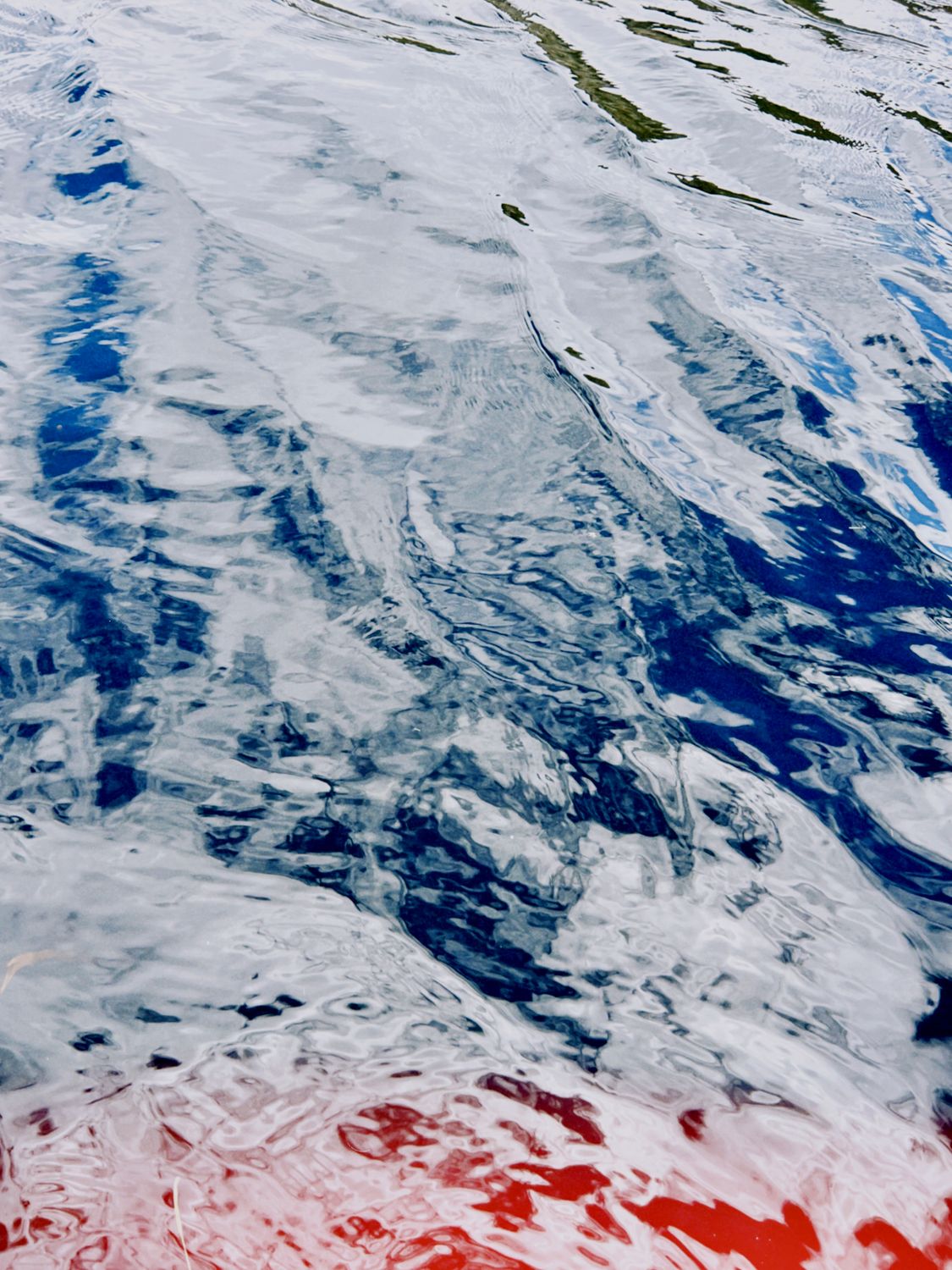 Abstract Water Reflect Abstract Water Reflection with Blue and Red Hues · Free Stock Photo