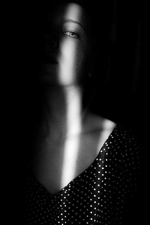 Woman Inside Dark Room