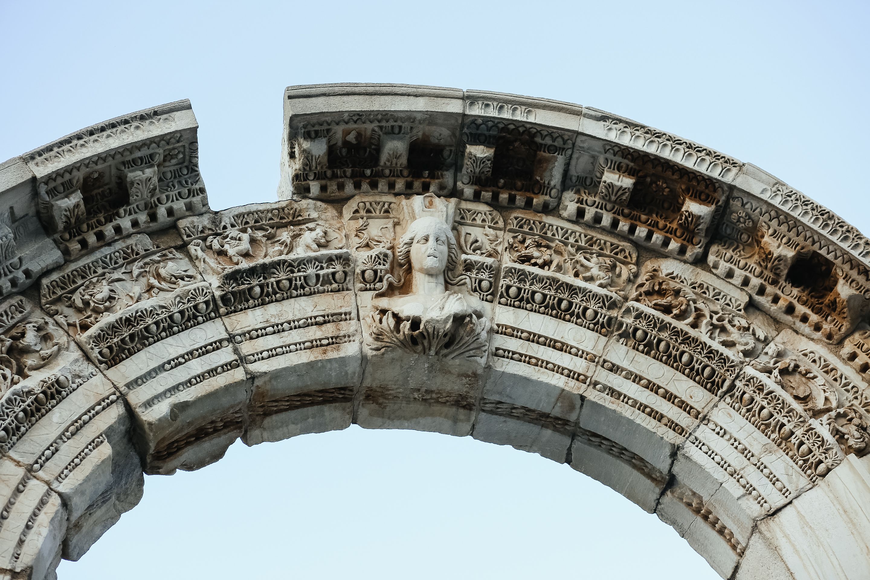 Intricately Carved Ancient Roman Arch Detail · Free Stock Photo