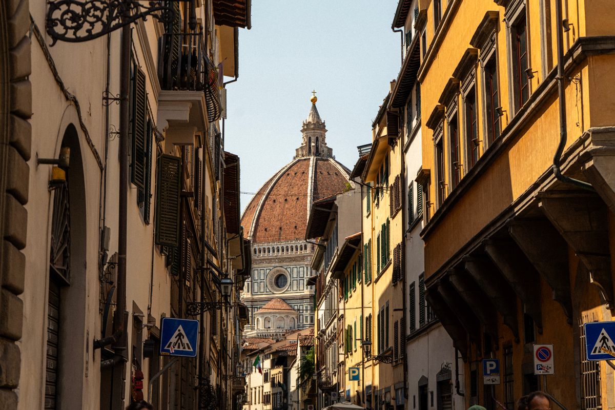 Florence Oltrarno neighborhood narrow street with traditional buildings and atmosphere