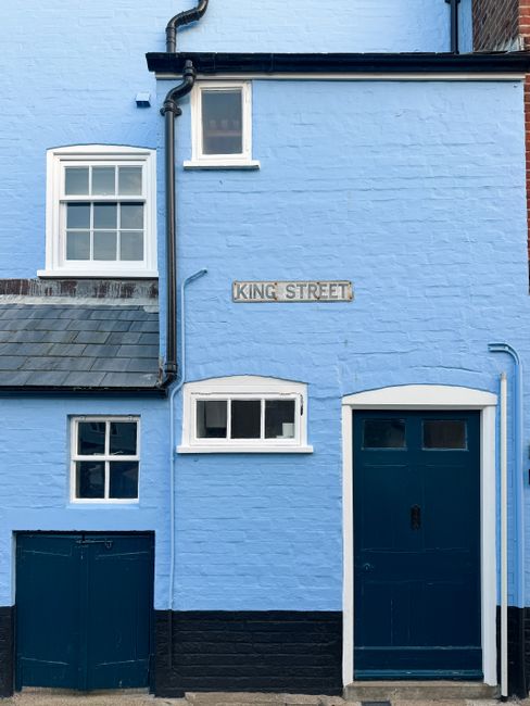 Charming blue house facade on King Street, Aldeburgh, showcasing English coastal architecture.