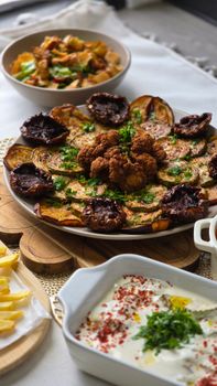 Delicious Mediterranean dishes featuring herbs and vegetables, perfect for a wholesome meal.
