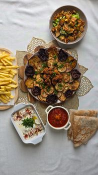 A variety of Middle Eastern dishes beautifully arranged on a table ready for serving.