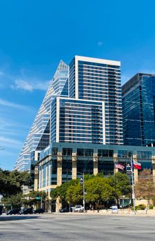 View of contemporary skyscrapers in Austin, Texas under a clear blue sky.