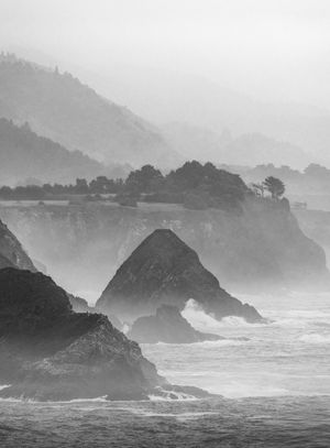 Fog over a rocky coastline — Griffin Wooldridge on Pexels