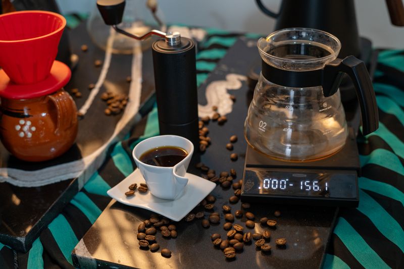 Home brewing setup with freshly roasted coffee beans from Grounded Coffee Co.
