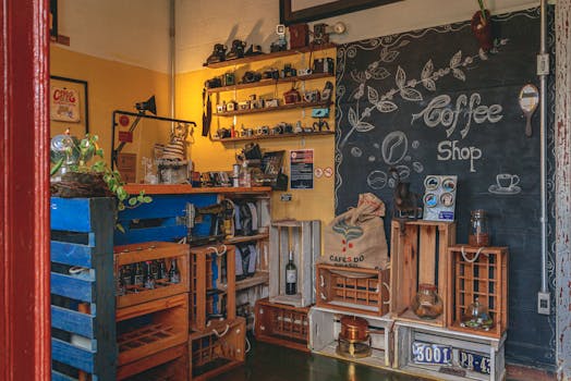 Explore a vintage coffee shop adorned with retro cameras and rustic decor, perfect for enthusiasts.