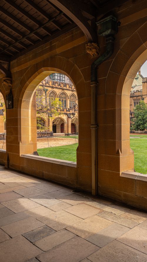 Free Beautiful sandstone arches viewed at the University of Sydney's quadrangle. Stock Photo