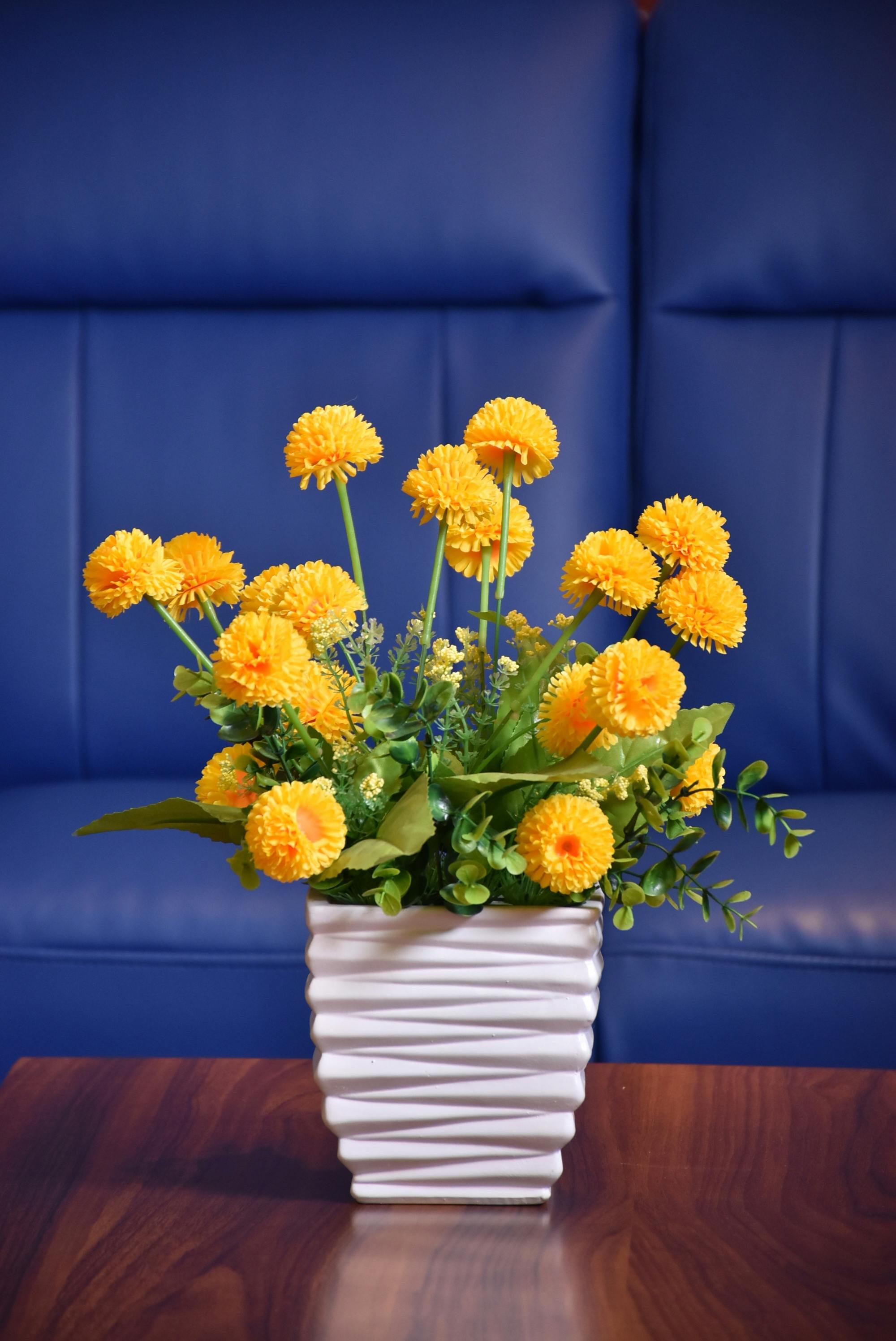 Free stock photo of artificial flowers, flower pot, yellow flowers