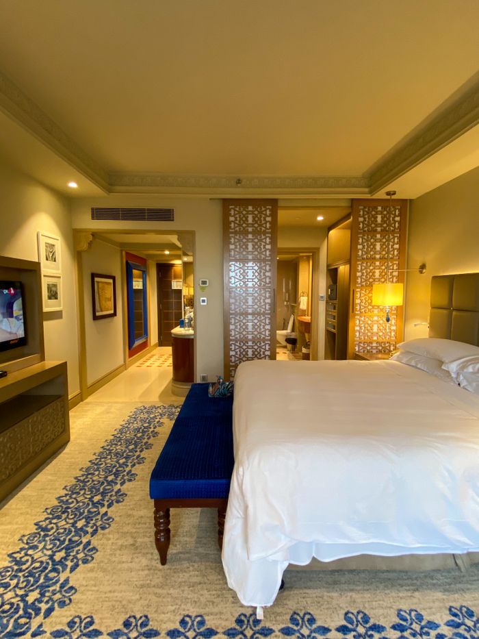 Spacious luxury hotel room with elegant decor