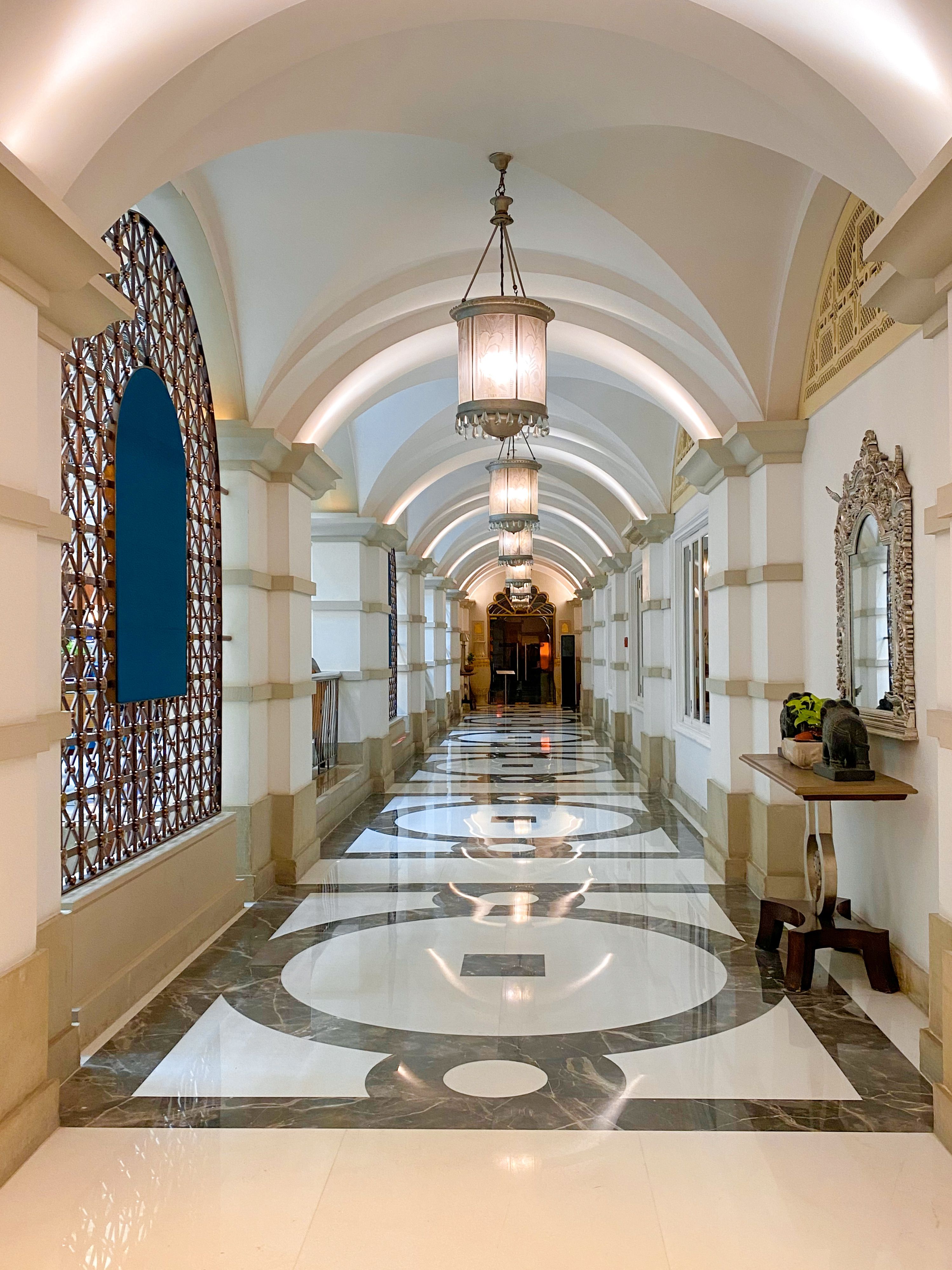Elegant hotel corridor with stylish lighting and luxury finishes