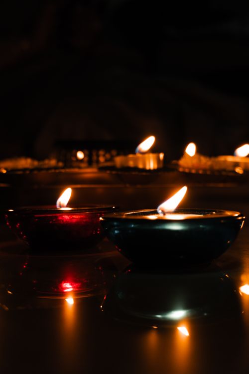 Free Colorful diyas and candles create a warm glow celebrating the Diwali festival in India. Stock Photo