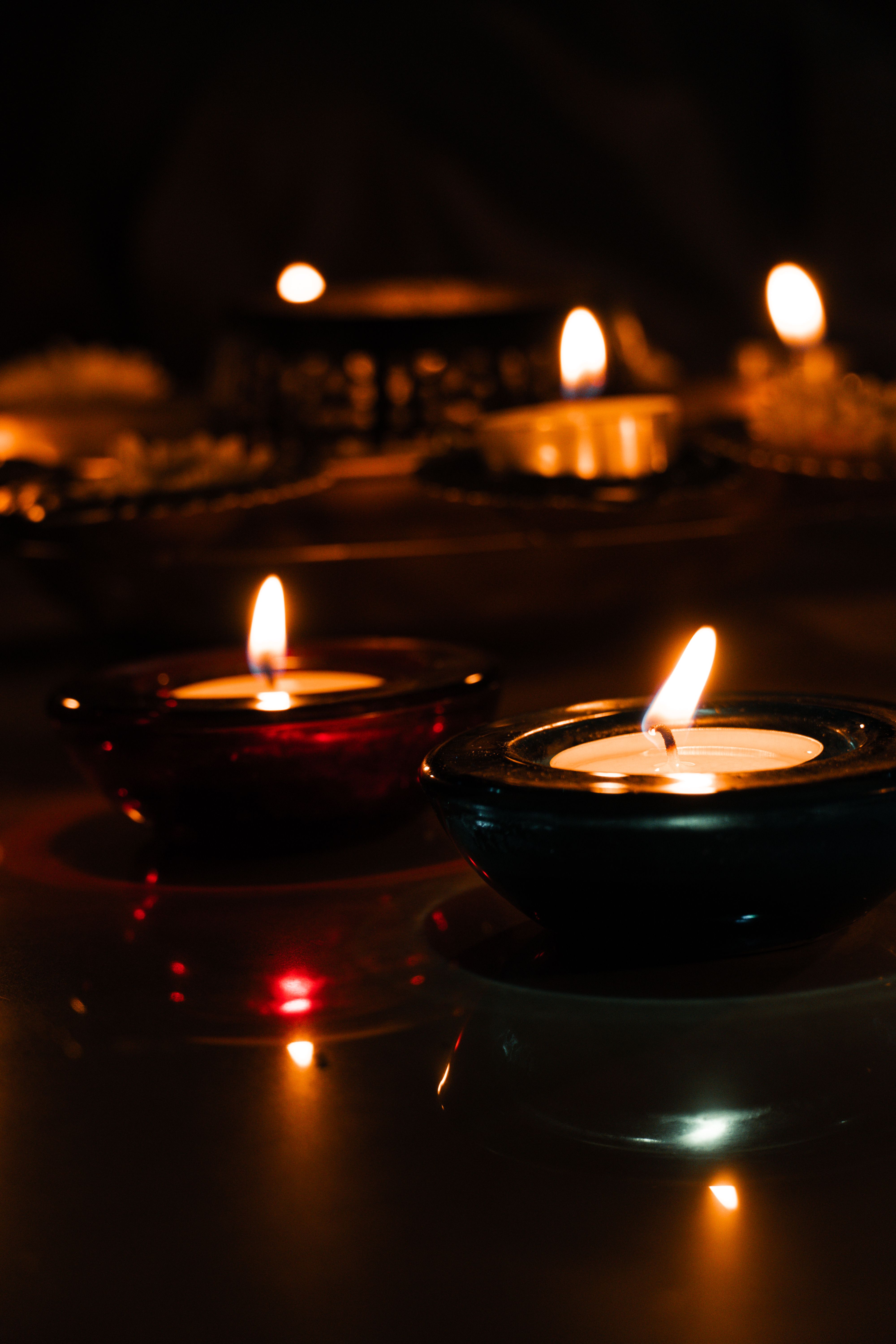 Rows of Diwali diyas lit up at night