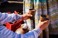 Colorful Peruvian tradition featuring chicha de jora served in Arequipa's vibrant festivities.