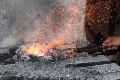 Sparks flying from a glowing forge — photo by İlker Söyük on Pexels