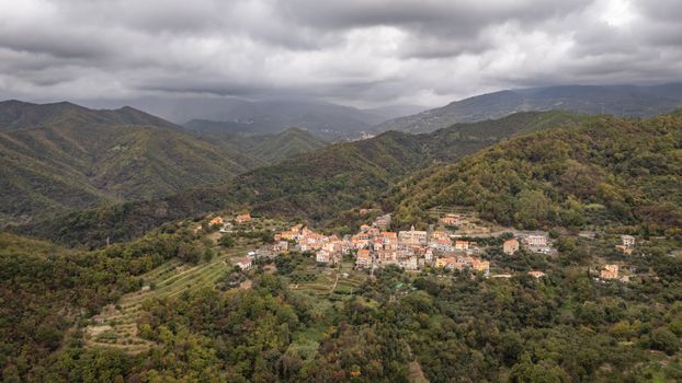 A breathtaking aerial view of the picturesque village of Gameragna nestled in the Ligurian hills.