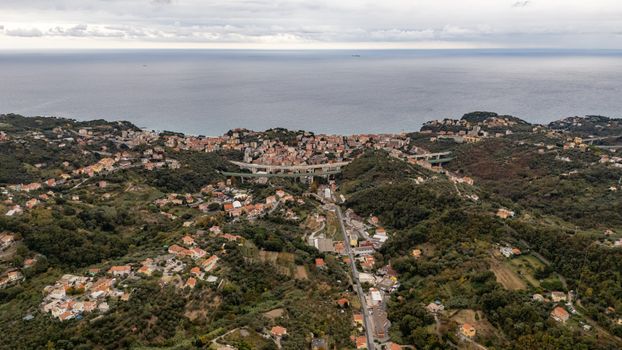 Discover the picturesque landscape of Gameragna, Liguria, Italy with a stunning aerial view of the village and coastline.