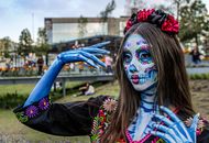 Festive Dia de los Muertos face painting in Toluca, honoring Mexican culture and tradition.