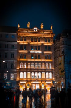 A beautiful Louis Vuitton store in a historic building in Vienna, Austria, captured at night.