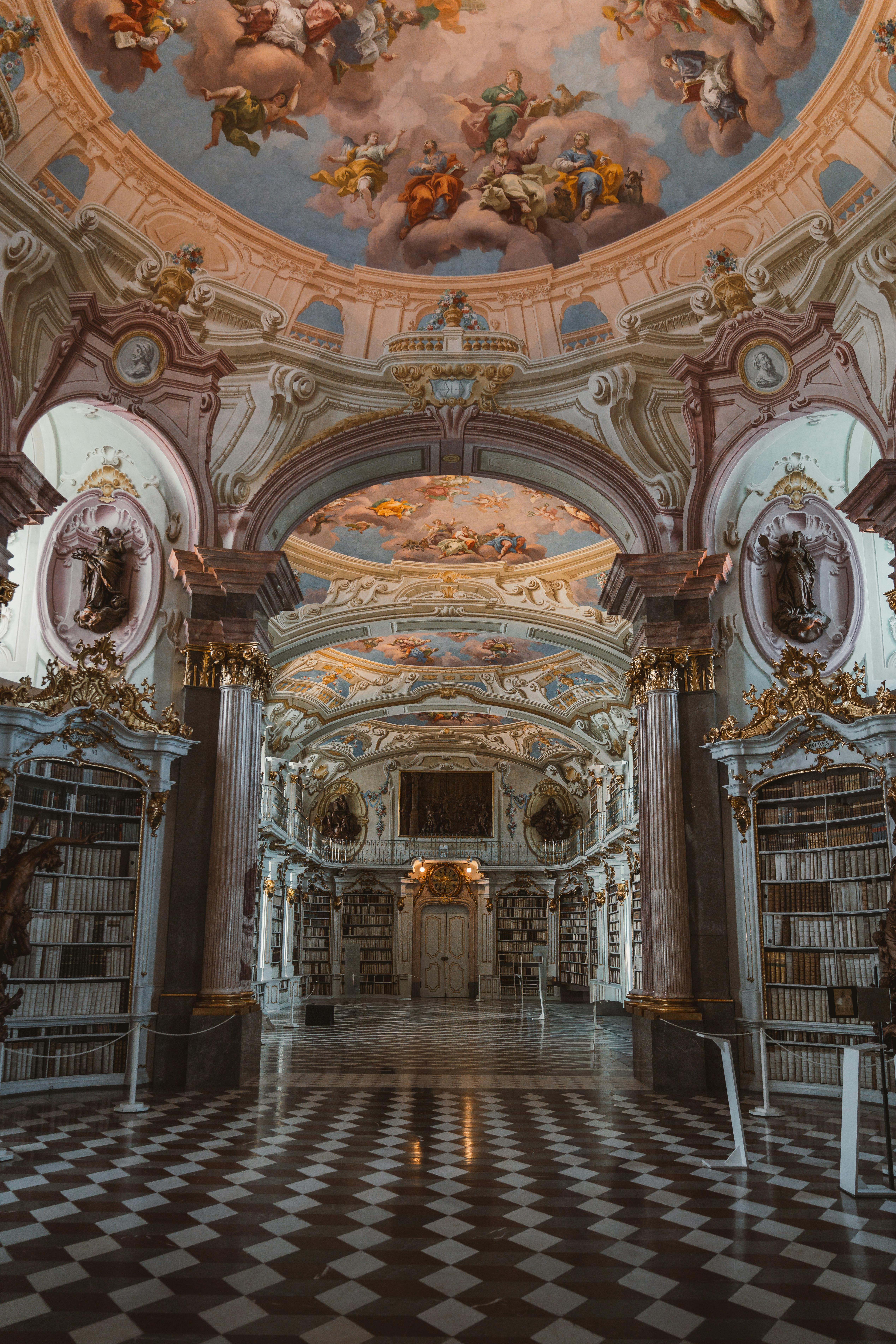 Explore the grandeur of Admont Abbey's baroque library with its stunning ornate architecture.
