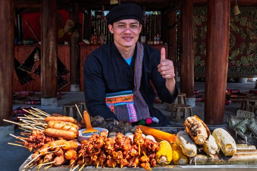 Explore vibrant Vietnamese street cuisine with a local vendor in Lao Cai, Vietnam.