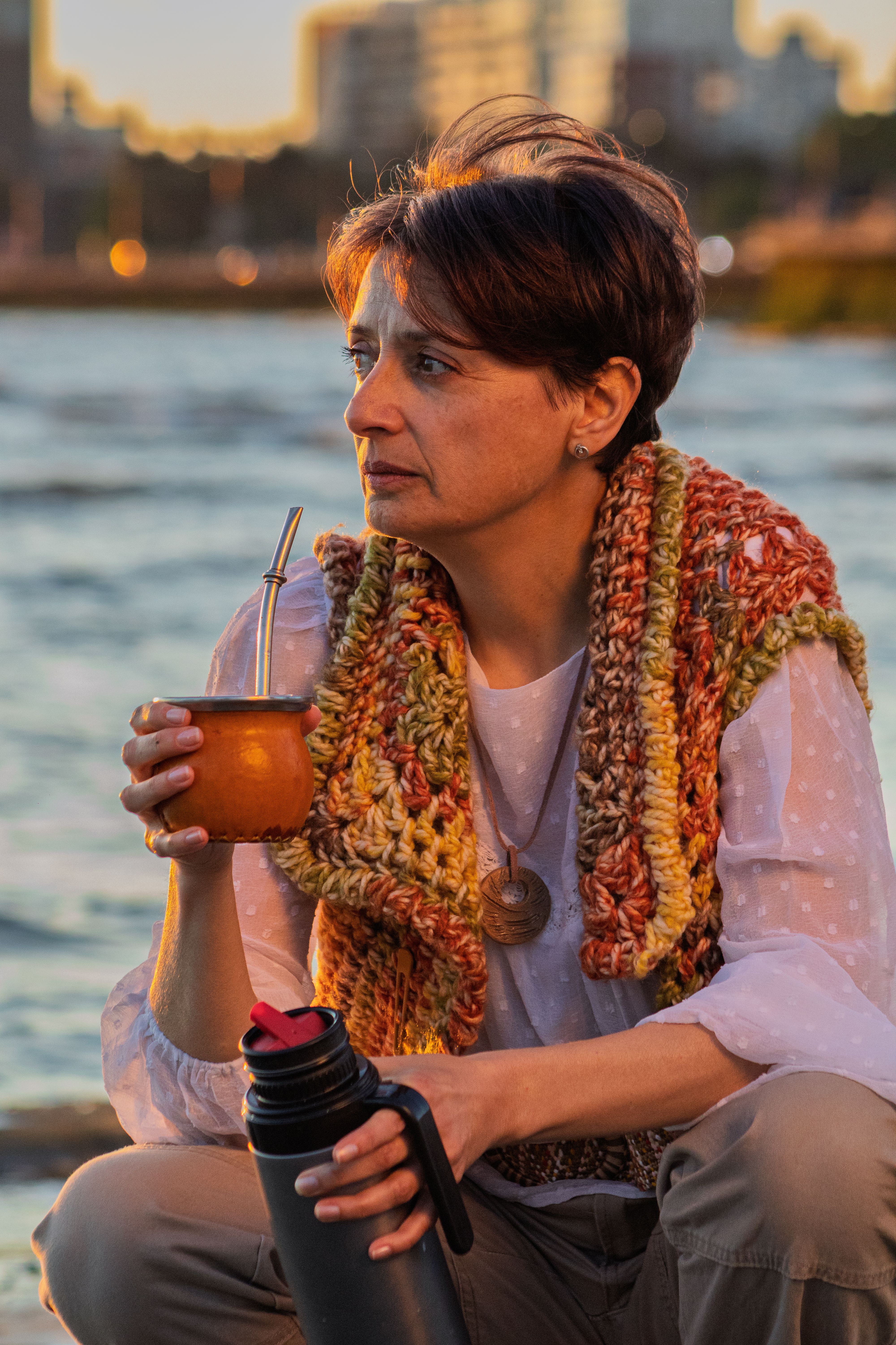 Woman Enjoying Yerba Mate by Montevideo Waterfront · Free Stock Photo